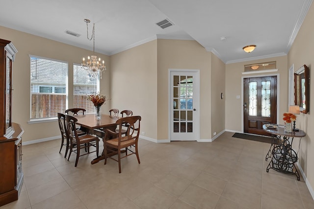 dining area with baseboards, visible vents, a chandelier, and ornamental molding