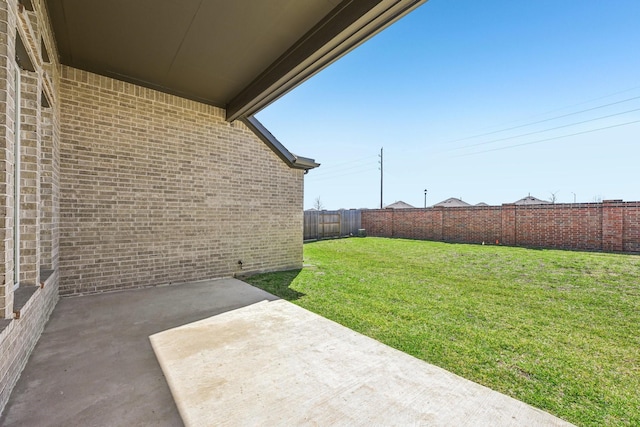 view of yard featuring a fenced backyard and a patio