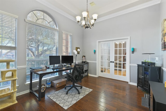 office area with plenty of natural light, french doors, baseboards, and hardwood / wood-style floors