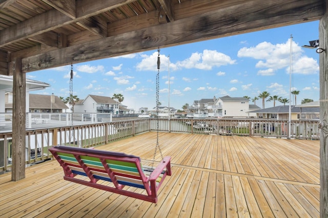 wooden deck with a residential view