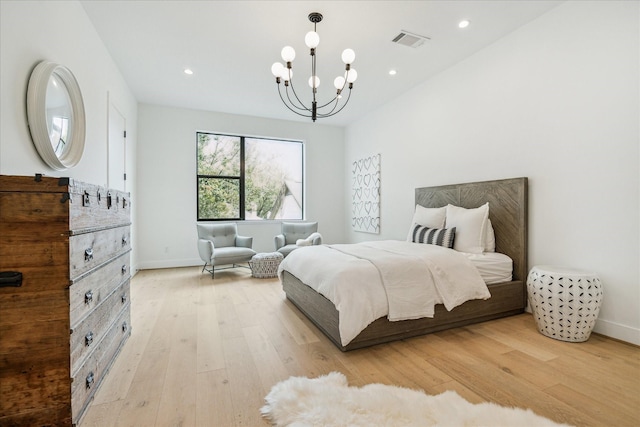 bedroom with visible vents, baseboards, light wood-type flooring, recessed lighting, and an inviting chandelier