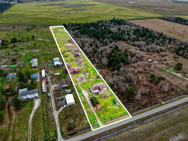 birds eye view of property featuring a rural view