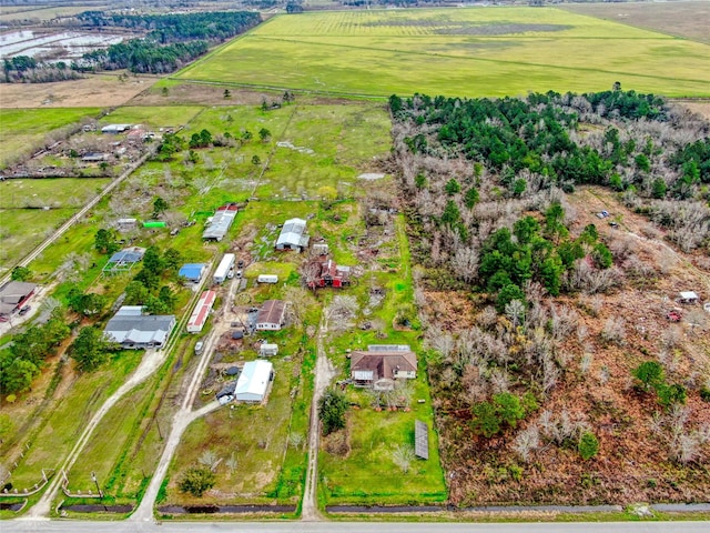 birds eye view of property featuring a rural view