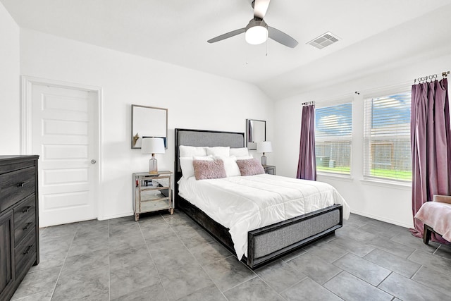 bedroom featuring visible vents, baseboards, a ceiling fan, and vaulted ceiling