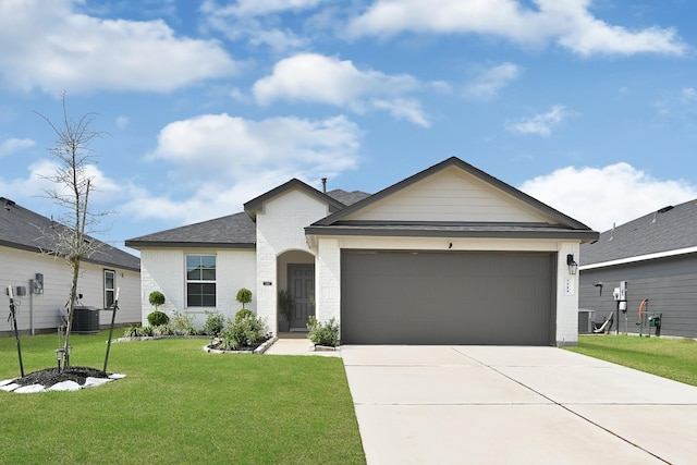 ranch-style home featuring concrete driveway, an attached garage, a front yard, brick siding, and central AC unit