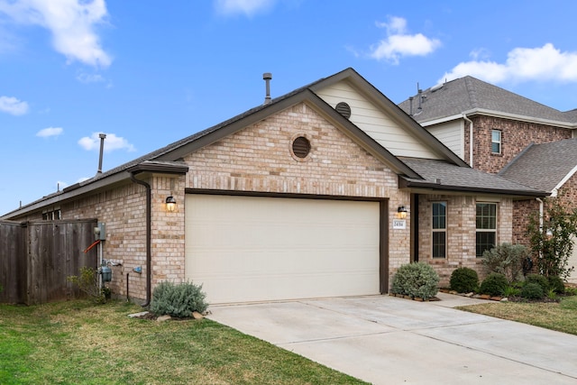 view of front of house with a garage, brick siding, and driveway