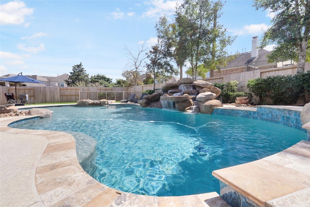 view of pool featuring a fenced in pool and a fenced backyard