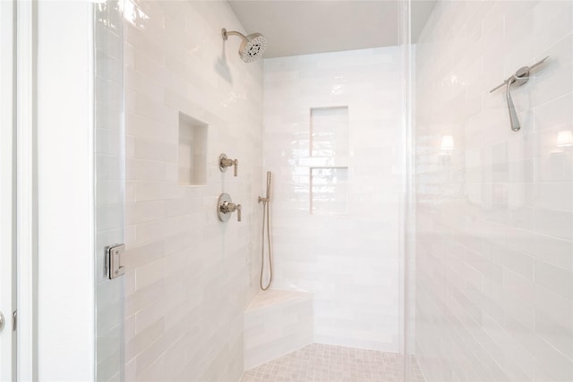 bathroom with a shower stall