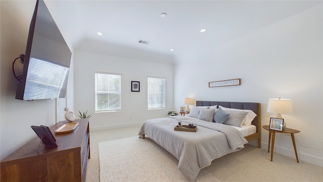 bedroom with recessed lighting, visible vents, baseboards, and light colored carpet