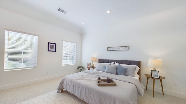 bedroom featuring recessed lighting, baseboards, visible vents, and light carpet