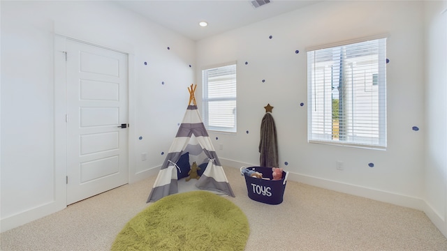 rec room with visible vents, recessed lighting, carpet, and baseboards