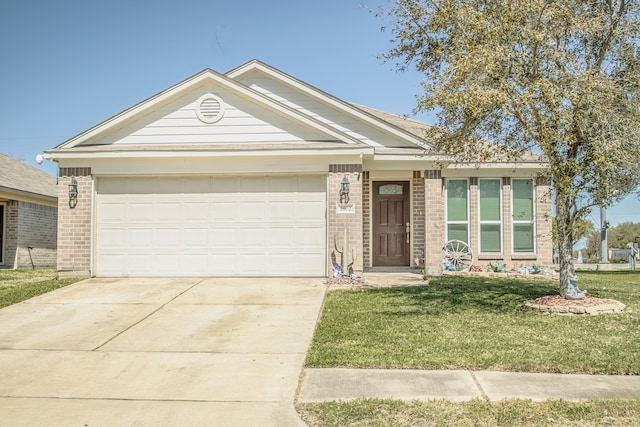 2602 Cardinal Elm St, Fresno, TX 77545 - ranch-style house with brick siding, a front lawn, driveway, and a garage