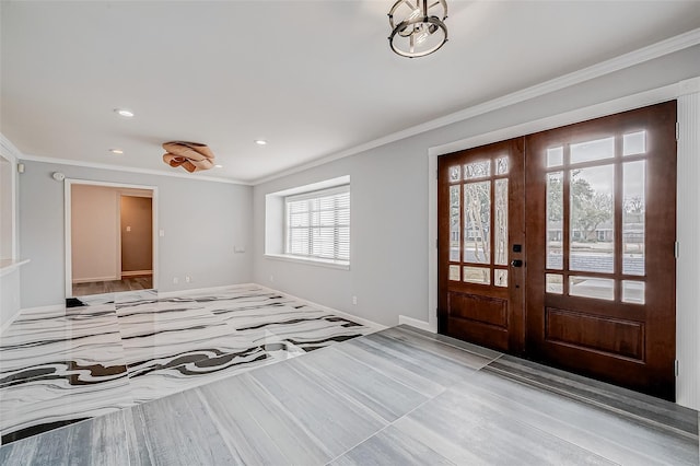 foyer entrance with recessed lighting, french doors, baseboards, and ornamental molding