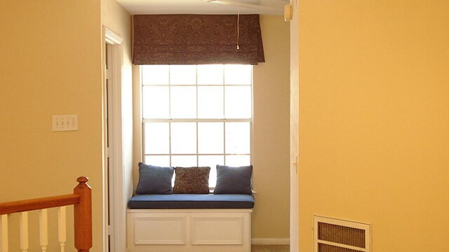 interior space featuring attic access and visible vents