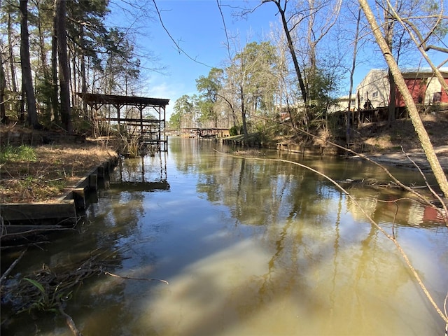 view of dock with a water view