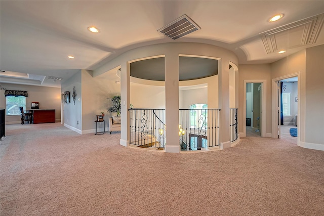 hall with recessed lighting, visible vents, attic access, and carpet flooring