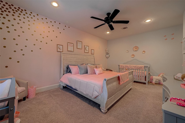 bedroom featuring baseboards, visible vents, recessed lighting, ceiling fan, and light carpet