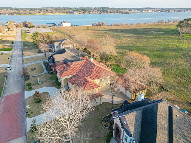 drone / aerial view with a water view