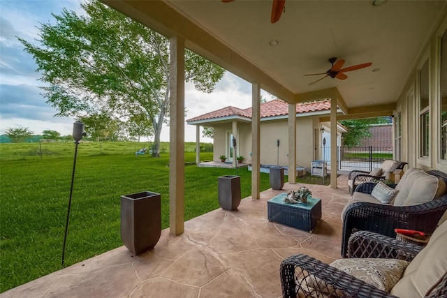 view of patio / terrace with outdoor lounge area and a ceiling fan