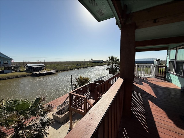 dock area with a water view