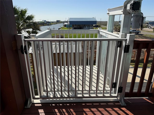 view of gate featuring a water view