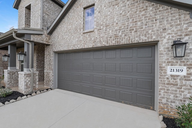 garage with driveway