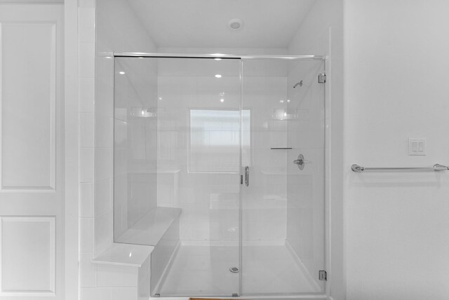 bathroom featuring a shower stall