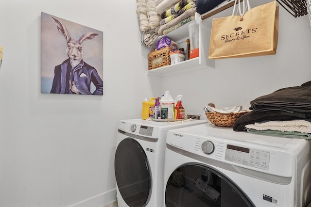 laundry area featuring laundry area and separate washer and dryer