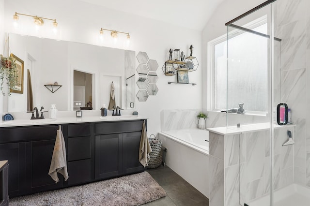 full bathroom with double vanity, a stall shower, a bath, and a sink