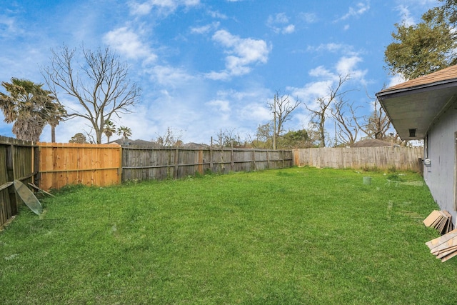 view of yard featuring a fenced backyard