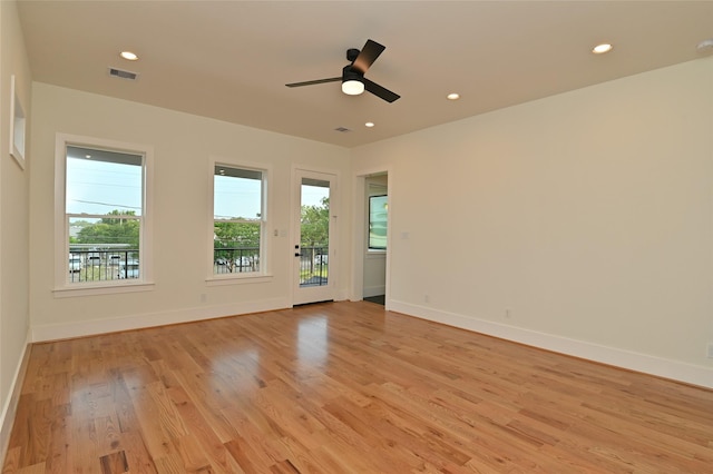 unfurnished room with recessed lighting, visible vents, baseboards, and light wood finished floors