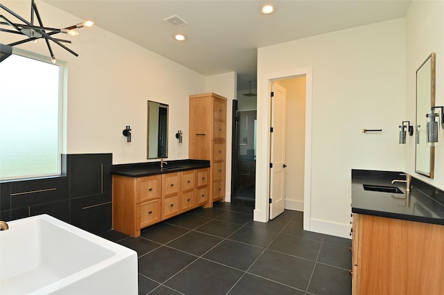 full bath with tile patterned flooring, visible vents, recessed lighting, a stall shower, and vanity