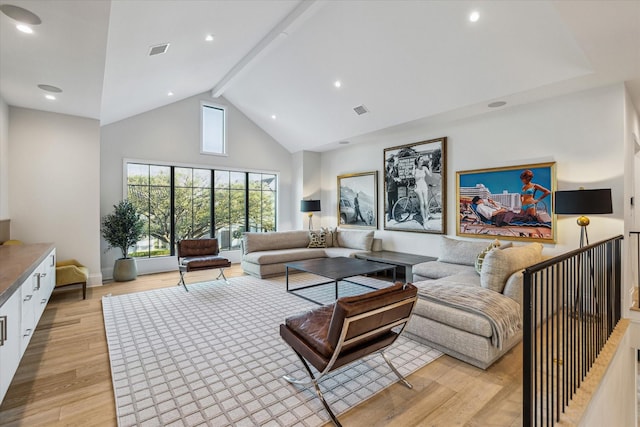 living room with beam ceiling, light wood-style floors, visible vents, and high vaulted ceiling