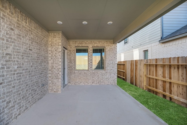 view of patio with fence