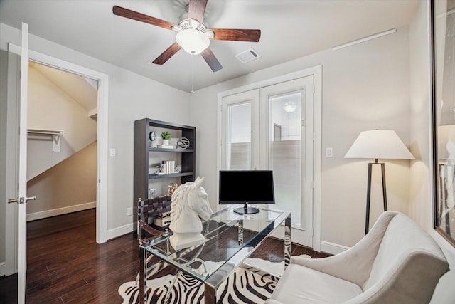 office space with visible vents, baseboards, wood finished floors, and a ceiling fan