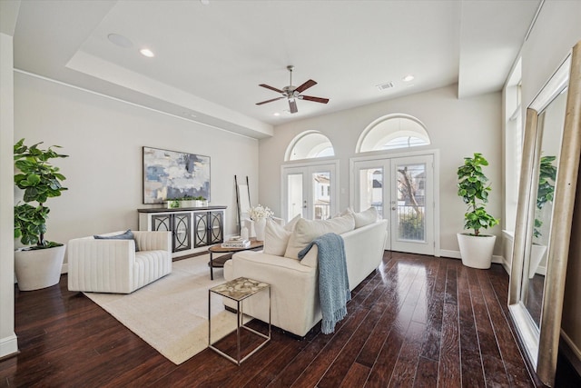 living room featuring visible vents, a ceiling fan, recessed lighting, french doors, and wood-type flooring