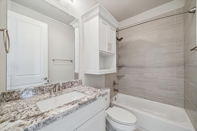 full bathroom featuring vanity, toilet, and shower / washtub combination