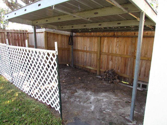 view of patio featuring fence