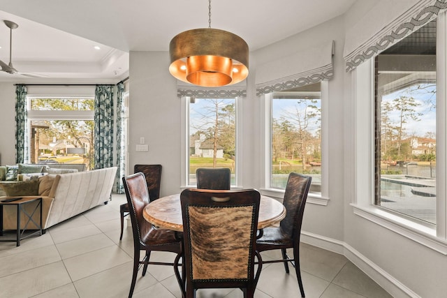 dining area featuring light tile patterned floors, plenty of natural light, recessed lighting, and baseboards