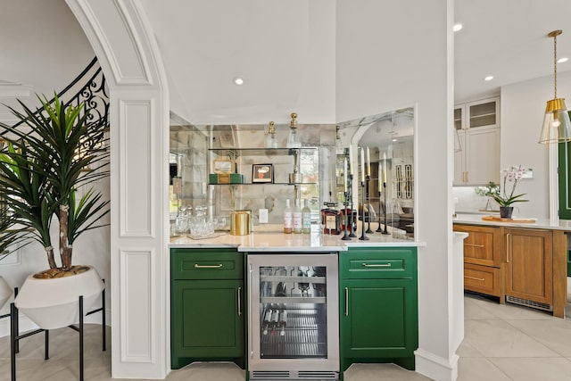 bar featuring beverage cooler, recessed lighting, light tile patterned floors, a dry bar, and hanging light fixtures