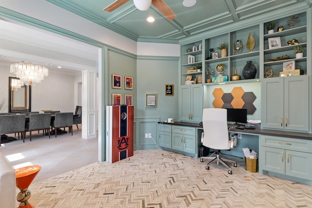 office area featuring built in shelves, coffered ceiling, built in desk, light tile patterned flooring, and crown molding