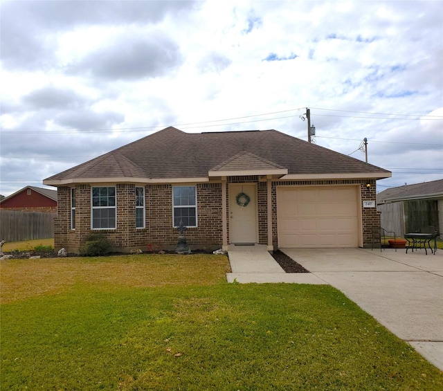 single story home featuring fence, concrete driveway, a front yard, a garage, and brick siding