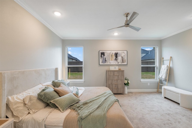 bedroom with a ceiling fan, carpet, baseboards, recessed lighting, and crown molding