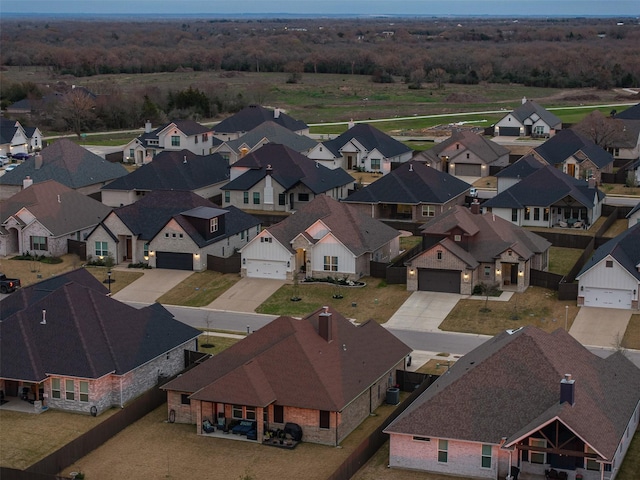 birds eye view of property with a residential view