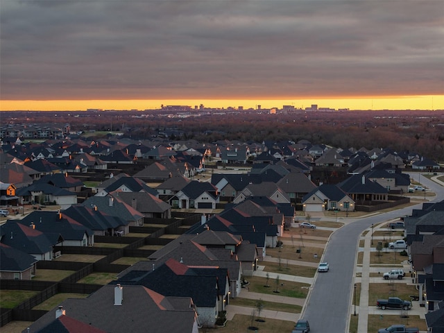 property's view of city with a residential view