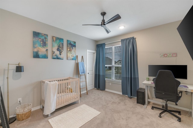 bedroom with baseboards, carpet, and a ceiling fan