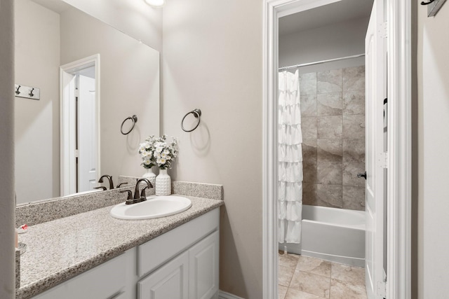 full bath featuring tile patterned flooring, vanity, and shower / bath combination with curtain