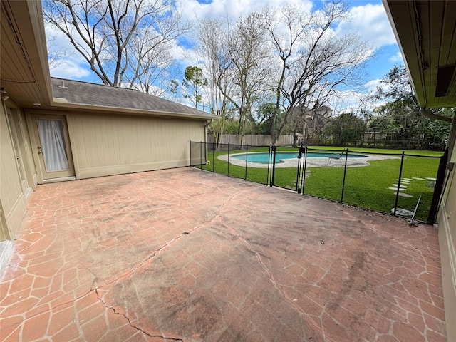 view of patio / terrace featuring fence and a fenced in pool