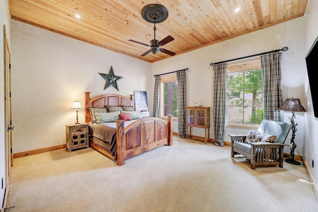 bedroom with wooden ceiling, carpet, and baseboards