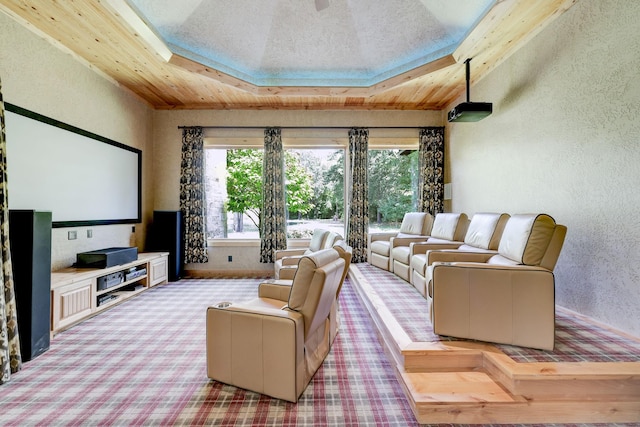 carpeted cinema featuring wooden ceiling, a textured ceiling, and a textured wall